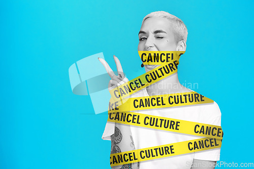 Image of Cancel culture, peace sign and overlay with woman and space for social media, cyber bullying and toxic message. Free speech, censorship and restriction with person on blue background for mockup space