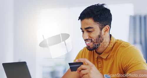 Image of Credit card, smile and business man with laptop in office for online shopping, digital banking or payment. Computer, ecommerce and happy male professional on internet for sales, finance and fintech.