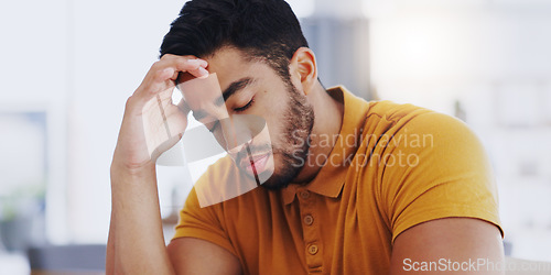 Image of Laptop, typing and business man with headache, tired or exhausted with fatigue in workplace. Computer, migraine and depressed male professional with anxiety, burnout or sick, brain fog or stress.