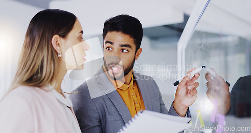 Image of Business people, teamwork and brainstorming at window for agenda, feedback notes or target process in office. Man, woman and employees planning project ideas, timeline strategy or schedule of mindmap