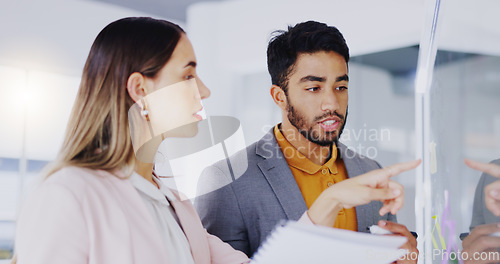 Image of Business people, teamwork and brainstorming at window for agenda, feedback notes or target process in office. Man, woman and employees planning project ideas, timeline strategy or schedule of mindmap