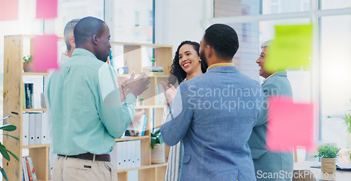 Image of Creative people, meeting and applause in celebration for winning, team achievement or unity at the office. Group of happy employees clapping in success for teamwork, promotion or startup at workplace