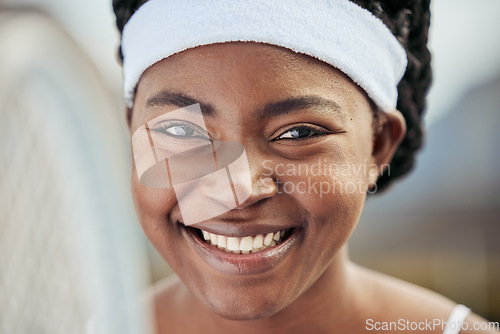 Image of Fitness, happy and portrait of woman tennis player with a racket practicing to play a match at stadium. Sports, smile and young African female athlete with equipment training on court for tournament.