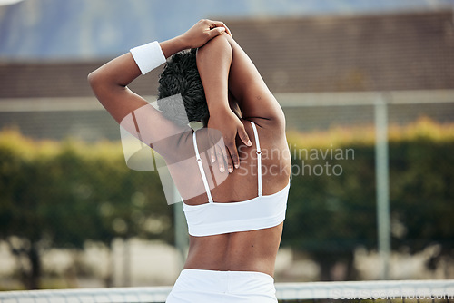 Image of Woman, back and stretching before tennis game for fitness, exercise and workout outdoor in Cape Town. Rear view, person and arm training for sport competition, challenge and wellness for performance