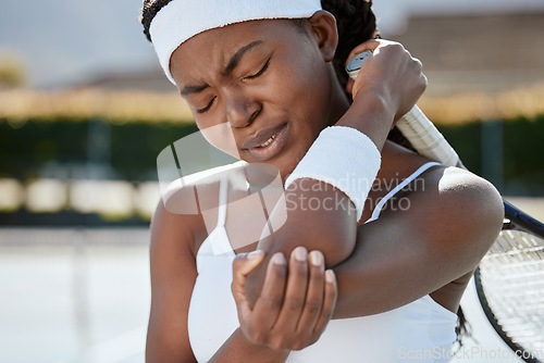 Image of Black woman, tennis and elbow pain from injury, fitness or outdoor athlete in medical emergency or joint inflammation. African female person or sports player with sore arm, ache or accident in match