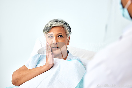 Image of Senior woman, toothache or pain and dental surgery at clinic, dentist and patient, healthcare and wellness. Teeth decay, cavity and orthodontics with oral care fail, health and face at hospital
