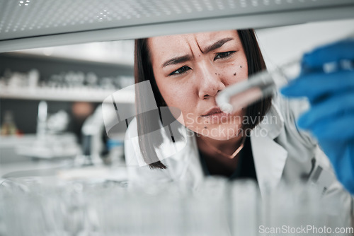 Image of Test tubes, scientist and confused woman with investigation, thinking and science research. Laboratory, professional and healthcare worker with medicine and liquid check for hospital and clinic test