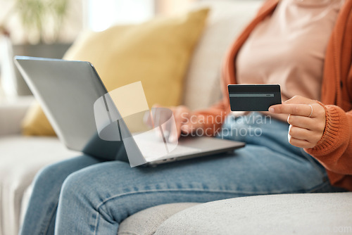 Image of Closeup, woman and laptop with credit card, ecommerce and fintech with transaction, payment and digital app in a lounge. Person, home or girl on a sofa, pc or finance with online shopping and savings