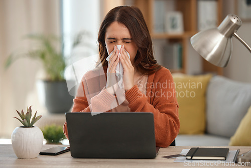 Image of Woman, blowing nose and student with laptop, allergies or burnout with virus, fatigue and sick with sinus infection. Toilet paper, health fail and overworked with university assessment while at home