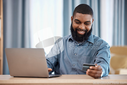 Image of Business man, credit card and laptop for office online shopping, e commerce payment and happy loan. African employee on computer for web banking, financial investment or registration for debit order