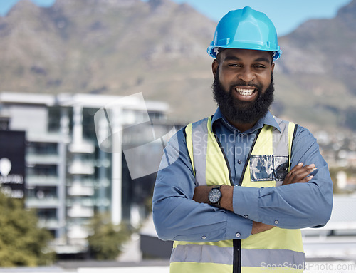 Image of Man, engineering portrait and arms crossed for city construction, project management or outdoor building design. Happy face of african worker in architecture, urban development or property leadership