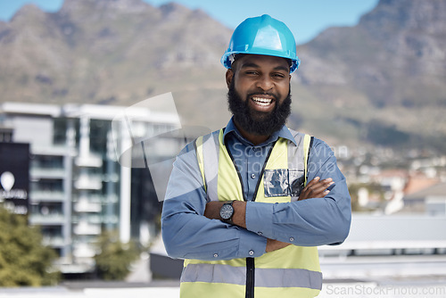 Image of Man, architecture portrait and arms crossed for city construction, project management or outdoor building design. Happy face of african worker in engineering, urban development or property leadership