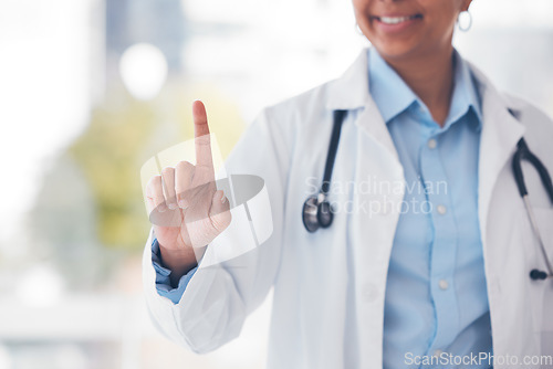 Image of Finger, doctor and black woman in hospital for user interface, biometrics and ux for telehealth. Futuristic, healthcare and worker with hand gesture for digital scan, clinic ex and medical research