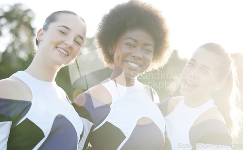 Image of Cheerleader, happy and portrait of women for performance, dance and motivation for game. Teamwork, dancer and people in costume cheer for support in match, competition and sports event outdoors