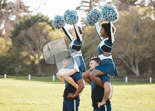 Image of Cheerleader, sports and men carry women on field for performance, dance and motivation for game. Teamwork, dancer and people balance and cheer for support in match, competition and event outdoors