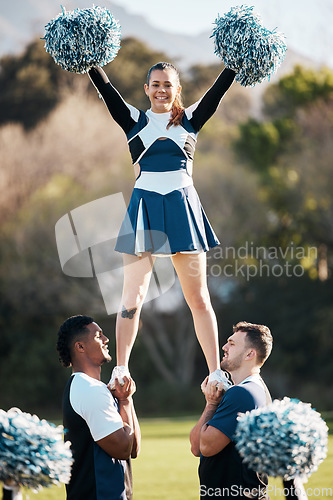 Image of Cheerleader, sports and men balance woman on field for performance, dance and game motivation. Teamwork, dancer and people in costume cheer for support in match, competition and event outdoors