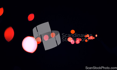 Image of Bokeh, cosmic red dots and black background with pattern, texture and mockup with aesthetic lights. Night lighting, sparkle particles and glow on dark wallpaper with space, color shine and flare.