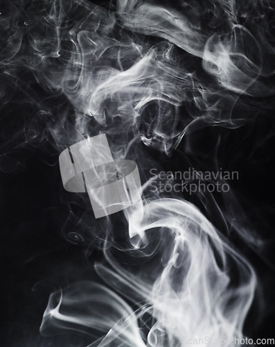 Image of Smoke, fog or mist on dark background, vapor wave with cloud of gas and fantasy in a studio. Texture, steam or spray with mystery, magic and cigarette, dry ice with special effects and moving smog