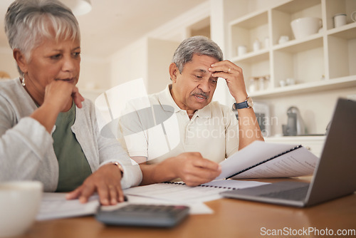 Image of Debt, stress and senior couple with financial, bills and budget at computer with paperwork. Anxiety, banking problem and savings planning for pension and retirement in a home with web tax notes