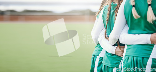 Image of Women, fitness team and huddle with back on sport field with mockup space outdoor. Arms linked, solidarity and workout together with friends and training for exercise and game with support and unity