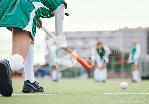 Image of Field, hockey and woman running in game, tournament or competition with ball, stick and team on artificial grass. Sports, team and women play in training, exercise or workout with teamwork on ground