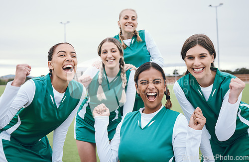 Image of Sports, field and portrait of happy woman with team, celebration and award winning at challenge. Diversity, hockey and excited group of women, winner at competition with smile and success at stadium.