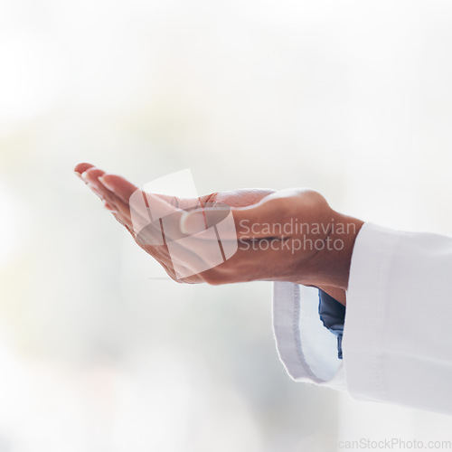 Image of Palm, healthcare and a doctor with space in the hospital for artificial intelligence or metaverse innovation. Medical, future and hands with a medicine professional closeup in a clinic for analysis