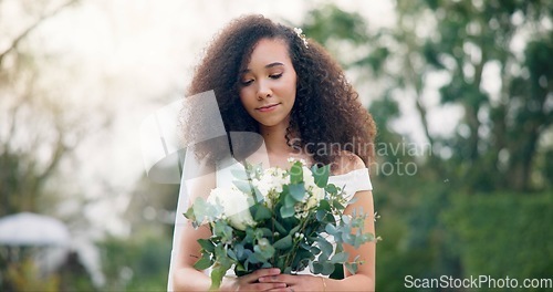 Image of Park, wedding and face of woman with flowers, beauty and smile outdoor for garden celebration. Roses, bride and portrait of lady with bouquet for special, event or elegant marriage ceremony in nature