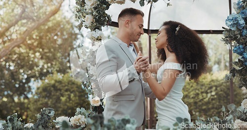 Image of Love, dance and couple at wedding for commitment and in celebration at a outdoor marriage ceremony or event for trust. Husband, wife and happy woman or bride with smile and care for partner together