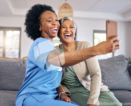 Image of Selfie, phone and assisted living caregiver with an old woman in the living room of a home together. Social media, support or community with a happy nurse or volunteer and senior patient in a house