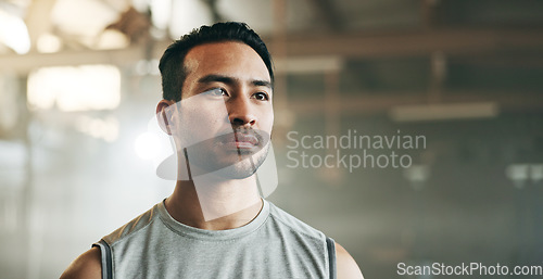 Image of Thinking, serious and a man at the gym for fitness, exercise idea or health. Motivation, sports and an Asian athlete or person planning at a club for training, wellness or cardio for a routine