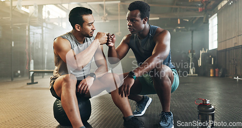 Image of Fitness, men and fist bump in gym with confidence, workout motivation and exercise class. Diversity, friends and wellness portrait of athlete with coach ready for training and sport at a health club