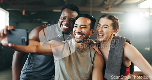 Image of Friends, phone and reading with laughing, gym or pointing with meme, funny joke or smile with web blog. Men, woman and fitness team with smartphone, comic video or memory for training in workout room