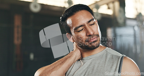 Image of Fitness, neck pain and face of man at gym for training with muscle, problem or arthritis. Sports, injury and guy athlete with shoulder, joint or massage for backache, fibromyalgia or osteoporosis