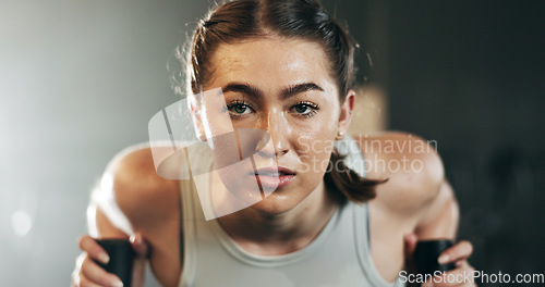 Image of Woman at gym, weight sled and muscle building endurance, strong body and balance power in fitness. Commitment, motivation and bodybuilder in workout challenge for health and wellness on push machine.