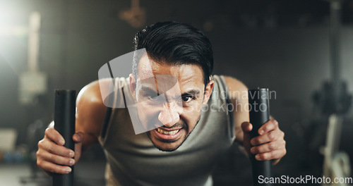 Image of Man at gym, weight sled and muscle building endurance, strong body and balance power in fitness. Commitment, motivation and bodybuilder in workout challenge for health and wellness on push machine.