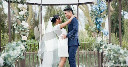 Image of Couple, wedding and dance with laugh or connection, commitment or gratitude to bride for romance. Happy partnership, support or marriage for together or excited in dress, ceremony or union in garden