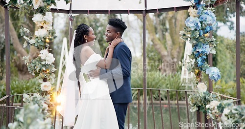 Image of Wedding, dance and black couple in garden with love, celebration and excited future together. Gazebo, man and woman at luxury marriage reception with flowers, music and happiness at party in nature.