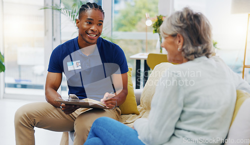 Image of Retirement, paperwork and a nurse talking to an old woman patient about healthcare in an assisted living facility. Medical, planning and communication with a black man consulting a senior in her home