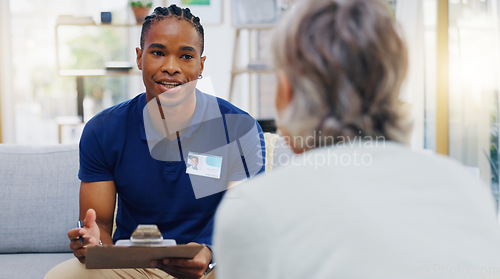 Image of Retirement, feedback and a nurse talking to an old woman patient about healthcare in an assisted living facility. Medical, planning and communication with a black man consulting a senior in her home