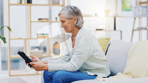 Image of Relax, tablet and senior woman on sofa in living room scroll on social media, mobile app or the internet. Rest, online and elderly female person browsing on website with technology in lounge at home.