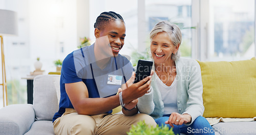 Image of Phone, medical and a nurse talking to a patient in an assisted living facility for senior people. Healthcare, mobile and contact with a black man medicine professional chatting to a mature woman