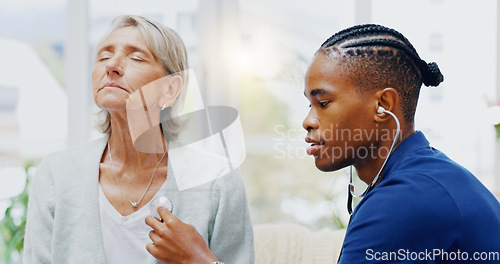 Image of Nurse, senior woman and stethoscope for breathing test for healthcare, wellness or listening for chest problem. Nursing home, listen and breathe with black man, elderly female patient for lung health