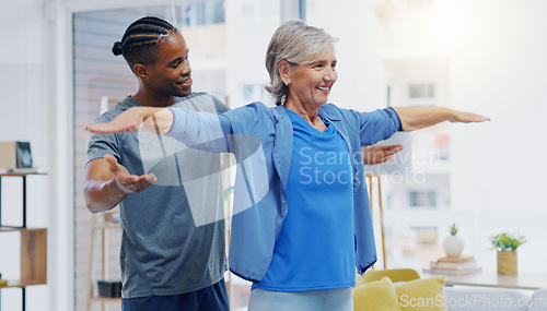 Image of Rehabilitation, elderly woman and nurse for stretching exercise in a nursing home. Happy senior patient with a therapist man for healing, health and physiotherapy for arms, strong muscle and body