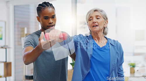 Image of Senior woman, nurse and rehabilitation with dumbbells exercise in a nursing home for fitness. Elderly patient with a therapist man for healing, health and physiotherapy for arms, muscle and body