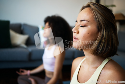 Image of Women, fitness friends and meditation with mindfulness, wellness and peace of mind with breathing at home. Yoga, spiritual and calm in living room with healing and zen, exercise and self care