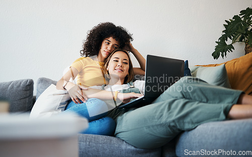 Image of Lgbtq, laptop and couple relax on sofa for watching movies, streaming series and online videos. Dating, lesbian and happy women on computer for internet, bonding and relationship in living room