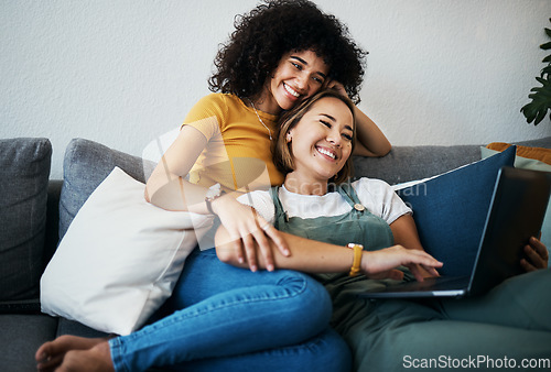 Image of Lgbtq, laptop and couple relax on sofa for watching movies, streaming series and online videos. Dating, lesbian and happy women on computer for internet, bonding and relationship in living room