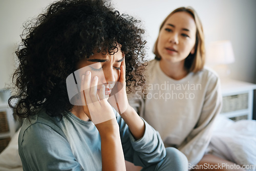 Image of Lgbtq, woman and depression for couple fight in bedroom of home with conflict, crisis or problem relationship. Lesbian, partner and girl on bed with stress, anxiety and sad for argument and divorce