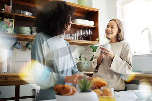 Image of Lesbian, women and couple with marriage, breakfast and romance with conversation, support and bonding. Lgbtq, girls and queer people in a kitchen, home and relationship with trust, talking and love